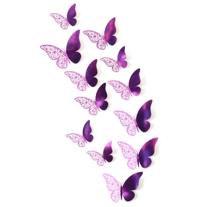 Detailed view of 3D purple gradient paper butterflies with laser-cut floral wing patterns