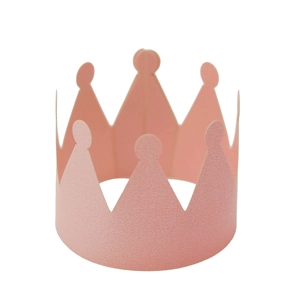 Close-up of a pearlescent pink paper crown napkin ring with scalloped edges for party