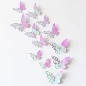 Detailed view of 3D iridescent laser hollow butterflies in various sizes on white background