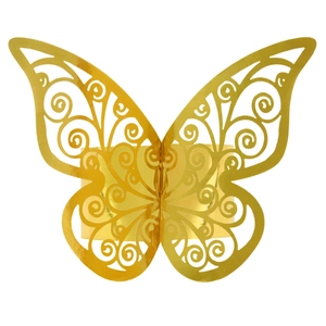 Detail of laser-cut golden butterfly napkin ring with intricate hollowed scroll patterns