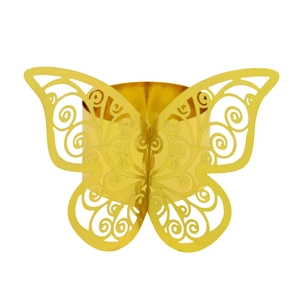 Detail of laser cut golden butterfly napkin ring featuring intricate scrollwork patterns