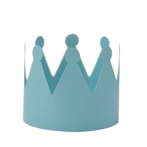 Detail of light blue crown paper napkin ring with serrated edge for birthday party decor