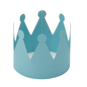 Detail of light blue paper crown for party decoration with frosted texture and round tips