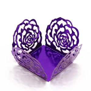 Detail of purple laser-cut rose floral pattern on metallic finish cupcake gift box