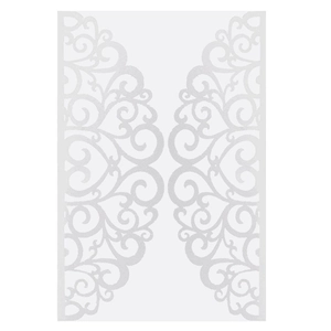 Macro detail of white laser-cut invitation card with elegant floral scroll patterns