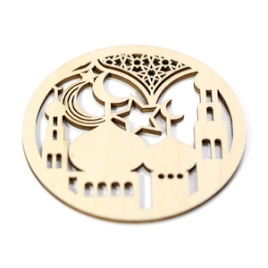 Detailed view of laser-cut wooden coaster with Islamic crescent and mosque patterns