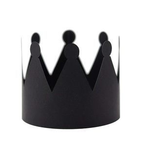 Detailed view of matte black paper crown napkin ring with sawtooth edge for party decor