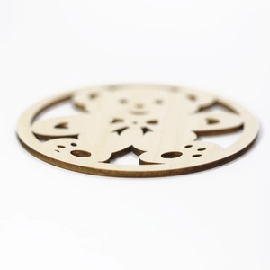 Minimalist wooden cup coaster featuring a cute hollowed bear and heart pattern design