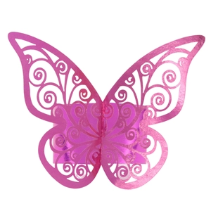 Detail of pink laser-cut butterfly napkin ring with intricate hollowed patterns