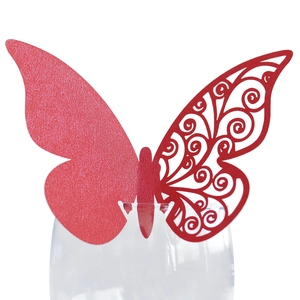 Close-up of red butterfly wine glass card with intricate laser-cut hollow design