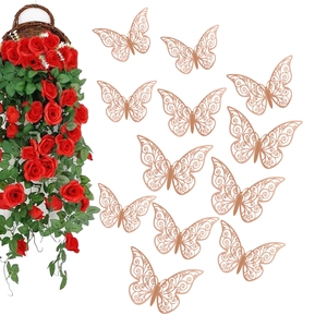Detail of 12pcs hollow rose gold butterfly wall stickers with intricate vine patterns