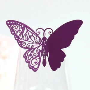 Purple laser-cut butterfly place cards for wine glass decoration and table settings