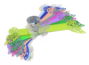 Macro detail of laser-cut butterfly napkin rings in various pearlescent and holographic colors