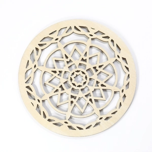 Laser-cut wooden mandala coaster with hollow geometric pattern for home decor