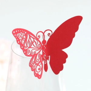 Detailed laser-cut red butterfly wine glass card for wedding table decor and party favors