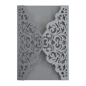 Laser cut floral hollow pattern on silver pearlescent paper invitation cover