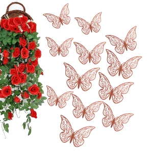 Detailed view of 12 rose gold 3D hollow butterfly wall stickers with spiral carved wings