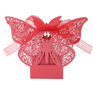Red laser-cut butterfly wedding favor box with intricate rose patterns and ribbon bow