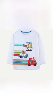 Detail of white cotton boy's long-sleeve tee featuring colorful animal cartoon prints