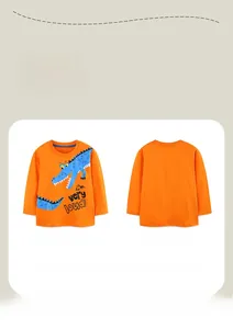 Front and back view of orange long sleeve kids shirt with a blue cartoon crocodile print