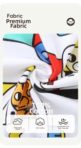 Close-up of 100% cotton kids t-shirt fabric with soft texture and cartoon prints