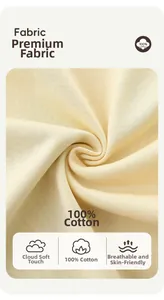 Detailed macro view of 100% cotton cream-colored knit fabric with soft texture