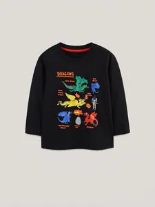 Kids long sleeve cotton T-shirt featuring colorful cartoon dragon prints on black fabric