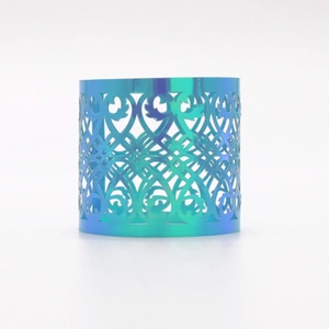 Detail of blue-green gradient napkin ring with baroque style hollowed-out vine pattern