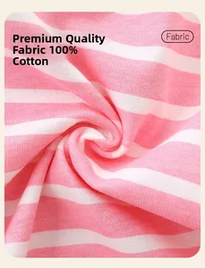 Gros plan sur le tissu en tricot 100% coton à rayures roses et blanches pour robe fille