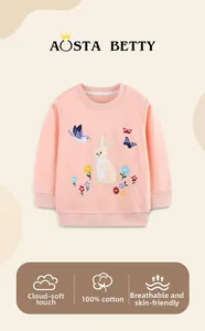 Detailed close-up of rabbit floral embroidery on pink 100% cotton kids sweatshirt