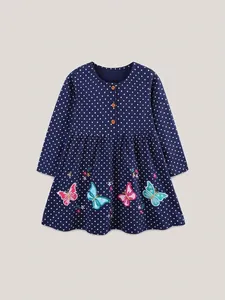 Girls long sleeve navy polka dot dress with colorful butterfly embroidery and yellow buttons
