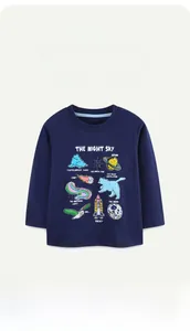 Close-up of boys long sleeve tee with night sky cartoon print and contrast neckline