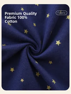 Close-up of soft 100% cotton navy blue fabric with gold star pattern for girls' dress