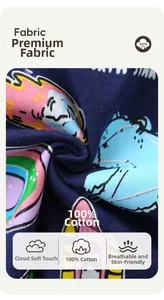 Detail view of 100% cotton knit fabric with colorful cartoon print on navy background