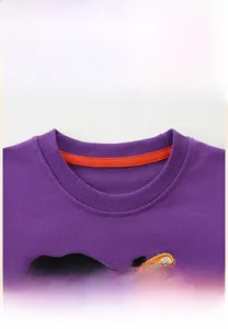 Detail of purple ribbed crew neck with orange reinforcement tape and embroidery