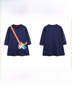 Flat lay of navy long-sleeve dress for girls featuring yellow stars and unicorn print