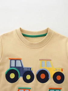Kids long sleeve beige sweatshirt with colorful cartoon tractor embroidery details