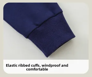 Detail of navy blue elastic ribbed cuffs on a dinosaur sweatshirt for kids