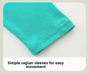 Detail of raglan sleeves with double needle stitching on turquoise cotton knit tshirt