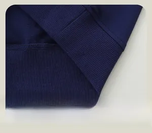 Detail of the ribbed hem and durable double-stitch seams on a navy boys' sweatshirt