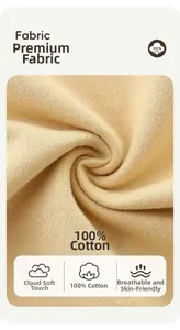 Macro shot of 100% cotton beige knit fabric showing soft breathable spiral texture