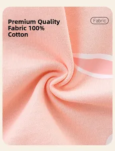 Dettaglio ravvicinato della trama in maglia di cotone 100% rosa per abiti bimba