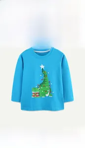 Detail of boys sky blue cotton t-shirt with Christmas crocodile print and festive lights