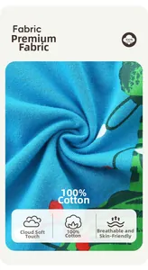 Macro detail of 100% cotton knit fabric showing soft texture and blue cartoon print