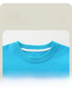 Detail view of reinforced crew neck on blue cotton toddler shirt with premium stitching