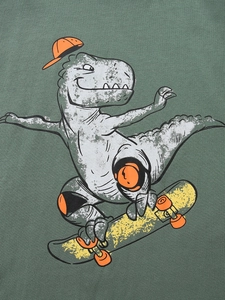 Dark green boys long sleeve T-shirt with cartoon T-Rex dinosaur on a skateboard