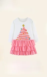 Detail of 100% cotton girls' long sleeve dress with Christmas tree print and pink polka dots