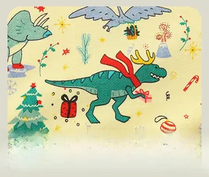 Detailed close-up of a Christmas dinosaur cartoon pattern on yellow cotton knit sweater