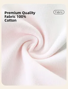 Detailed macro view of 100% cotton light pink knitted fabric texture for girl dress