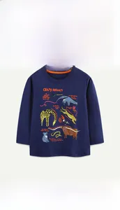 Close-up of boys long sleeve navy tee with colorful cartoon animal print and orange neckline